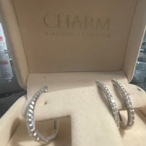 Diamond hoop earrings. White gold . 3 earrings.